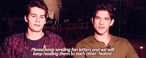 two young men are sitting next to each other and one of them is saying " please keep sending fan letters "