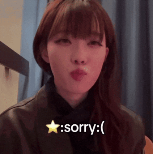 a woman says sorry with a star on the bottom right