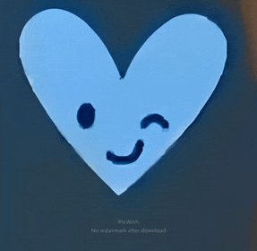 a picture of a heart with a smiling face on it