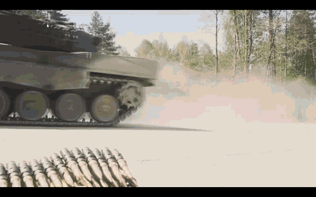 a tank is driving down a dirt road with a pile of bullets in the foreground