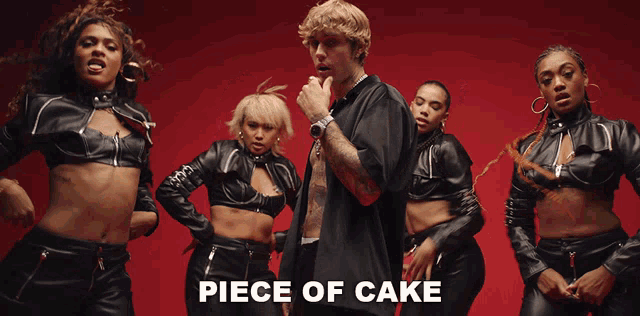 justin bieber is standing in front of a group of women with the words piece of cake below him