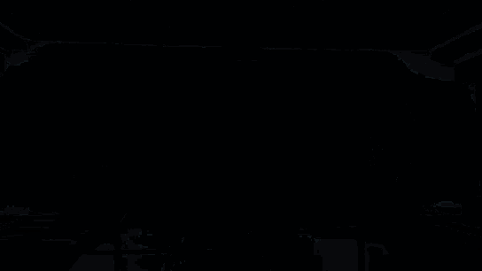 a dark room with a xrp logo in the center