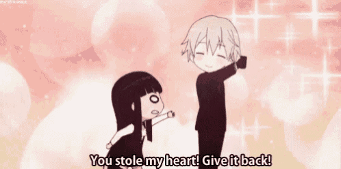 a boy and a girl are dancing and the girl is saying `` you stole my heart give it back '' .
