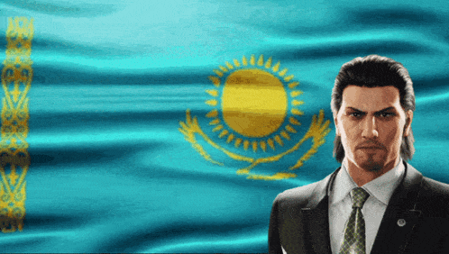 a man in a suit and tie stands in front of a blue flag