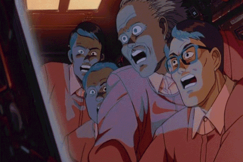 a group of men with their mouths open are looking at a screen