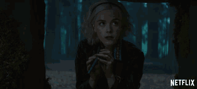 a netflix ad shows a woman in a forest
