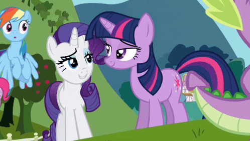 twilight sparkle and rarity are standing next to each other in a cartoon