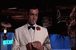 Checking The Watch - James Bond GIF - James Bond Sean Connery Nat Owatchstrap GIFs