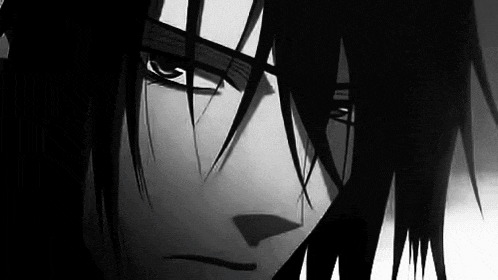 a black and white photo of a cartoon character with long black hair .