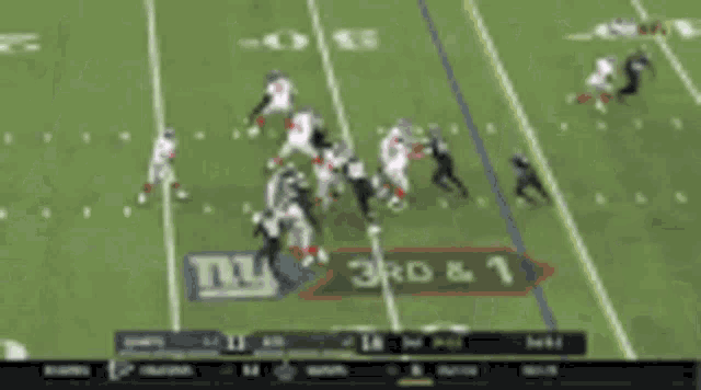 a football game is being played between the ny giants and the washington redskins