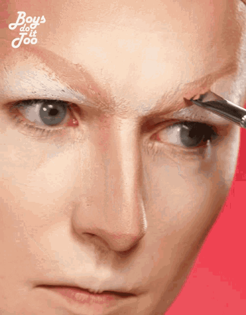 a close up of a woman 's face with boys do it joo written on the bottom right