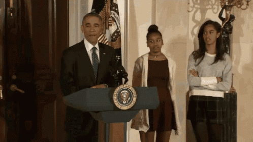 the president of the united states is giving a speech at a podium