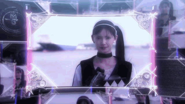 a woman stands in front of a screen that says 3