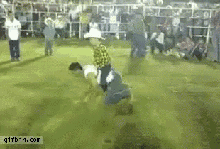 a group of people are dancing in a field with a gifbin.com watermark in the lower right corner