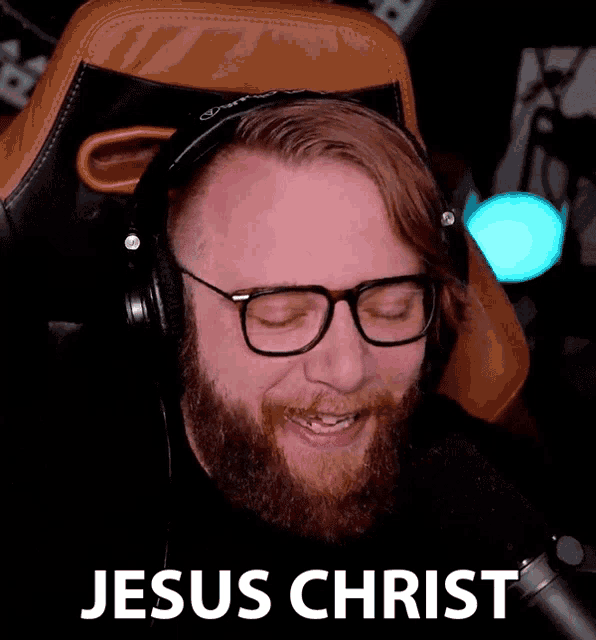 a man wearing glasses and headphones with the word jesus christ on the bottom