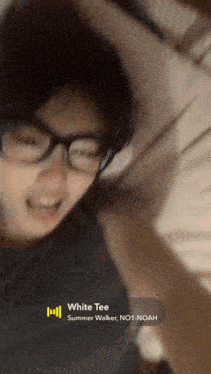 a person wearing glasses and a white tee summer walker no1 noah playlist