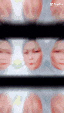 a picture of a woman 's face is displayed on a screen that says capcut
