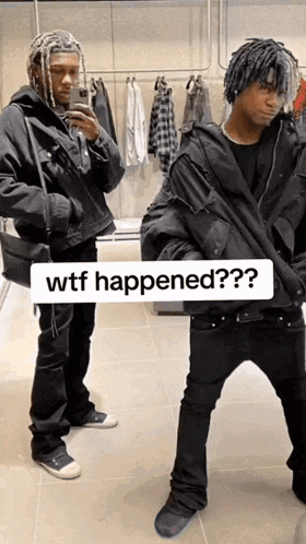 a man taking a picture of himself in a mirror with the caption wtf happened??