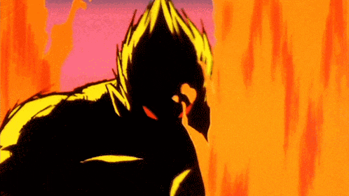 a man is standing in front of a wall of fire .