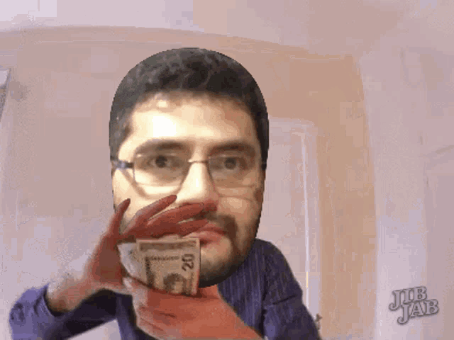 a man with glasses is holding a 20 dollar bill