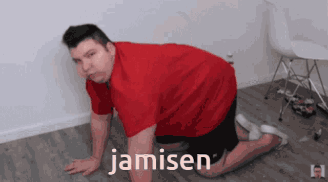 a man in a red shirt is crawling on the floor and the word jamisen is on the bottom