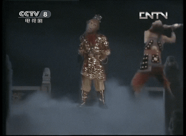 cctv 8 shows a man holding a sword while another man holds a sword