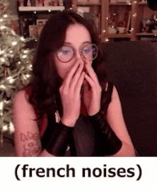 a woman wearing glasses is covering her nose with her hands and the words french noises are below her