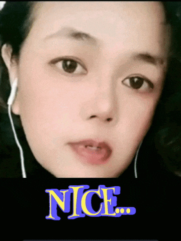 a woman wearing ear buds and the word nice behind her