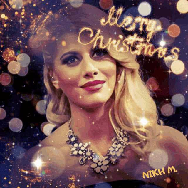 a woman wearing a necklace with the words merry christmas written on it