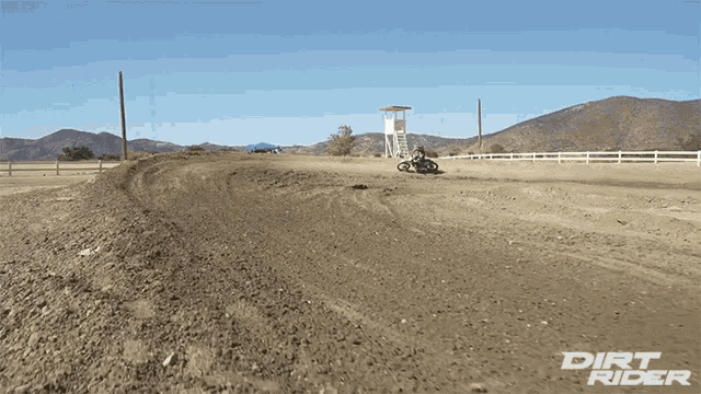 a dirt rider ad shows a person riding a dirt bike on a dirt track