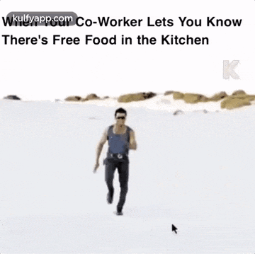 a man is running in the snow with the words `` co-worker lets you know there 's free food in the kitchen '' above him .
