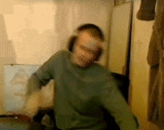 a blurry picture of a man wearing headphones
