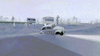 a car with the number 53 on it is driving down a road