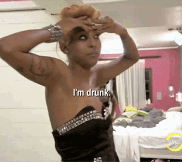 a woman in a black dress with the words i 'm drunk above her