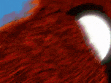 a close up of a person 's mouth with a red background