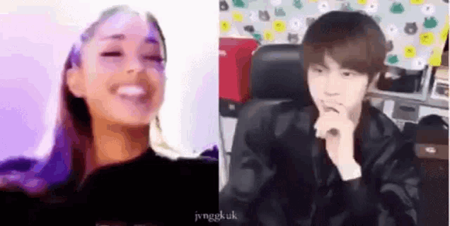 a man and a woman are sitting next to each other and laughing .