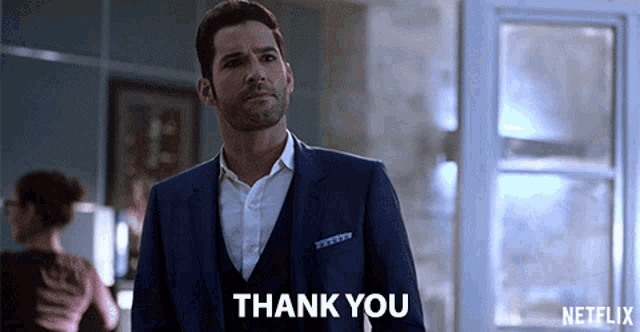 a man in a suit says thank you in a netflix advertisement
