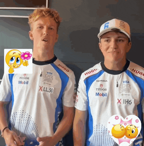 two men wearing blue and white shirts that say tudor mobil