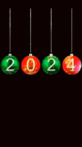 a happy new year greeting card with christmas balls hanging from a string .