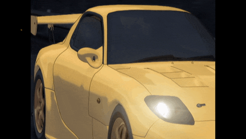 a yellow sports car with the letter g on the side