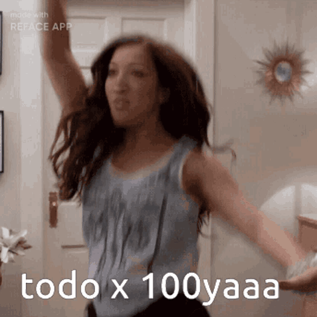 a woman in a blue tank top is dancing with the words todo x 100yaaa written below her