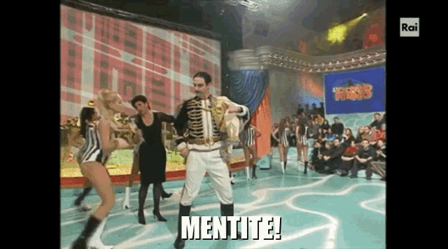 a man playing a saxophone in front of a crowd with the words " mentite " on the bottom