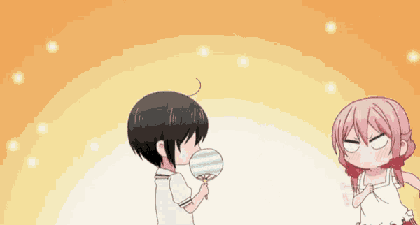 a boy and a girl are standing next to each other and the girl is holding a fan in her mouth .