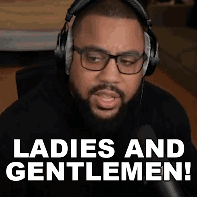 a man wearing headphones and glasses says " ladies and gentlemen "