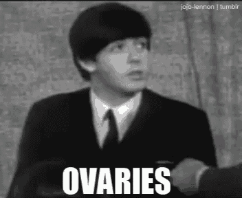a man in a suit and tie says ovaries