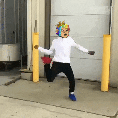 a person wearing a rainbow colored mask is jumping in front of a garage door