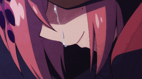 a close up of a person 's face with a tear running down their face