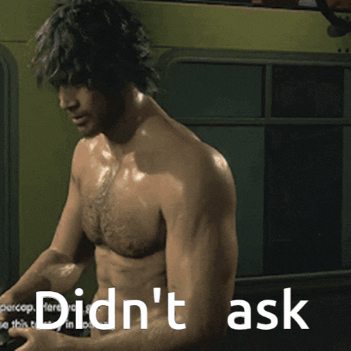a shirtless man is standing in front of a sign that says " did n't ask "