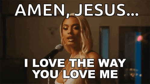 a woman singing into a microphone with the words amen jesus i love the way you love me above her