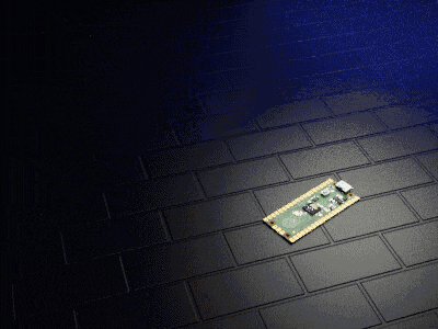 a small electronic device is laying on a black tiled floor